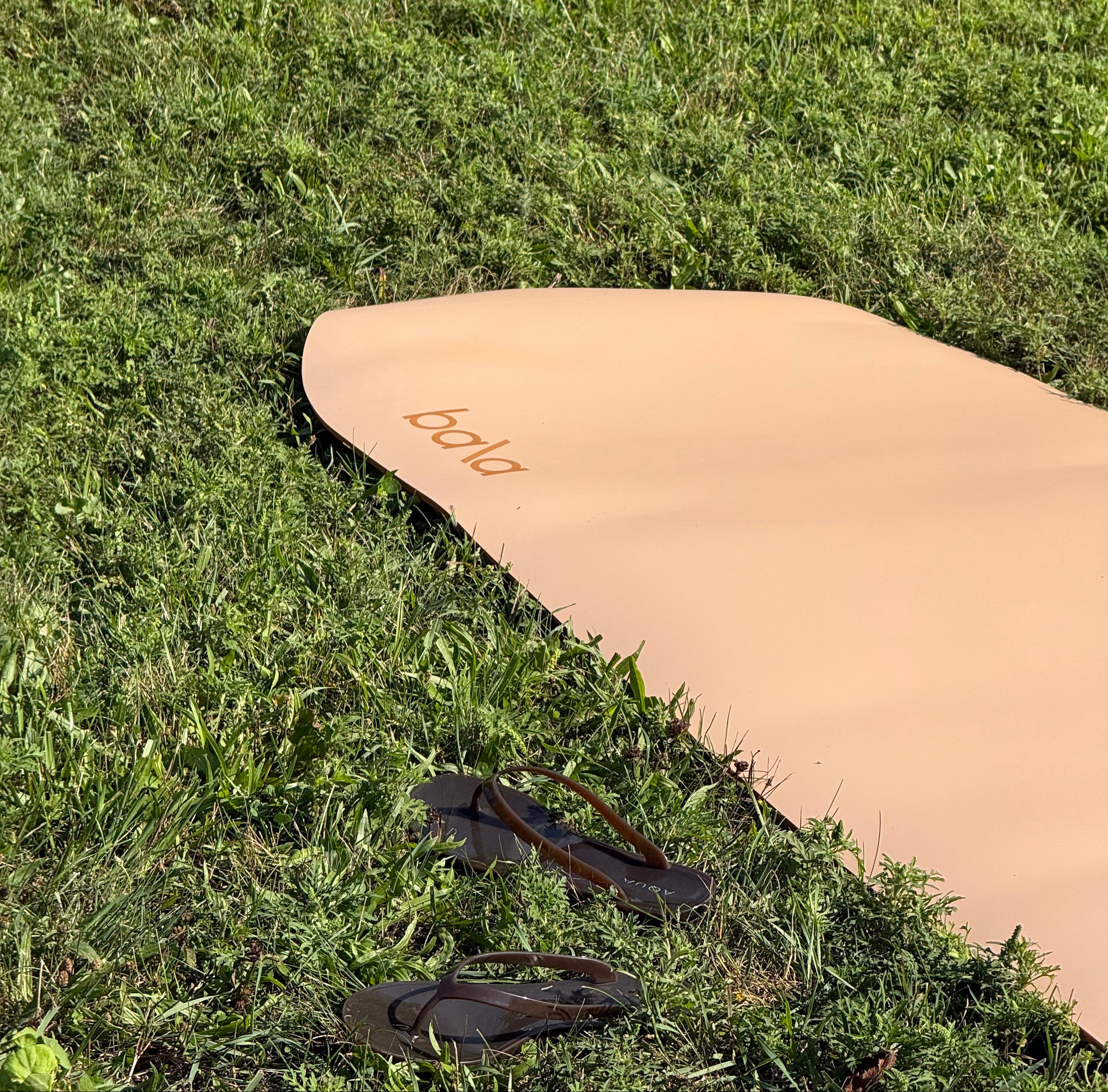 Sand Bala mat on grass for Pop Up Sculpt Drop 001 in Madison